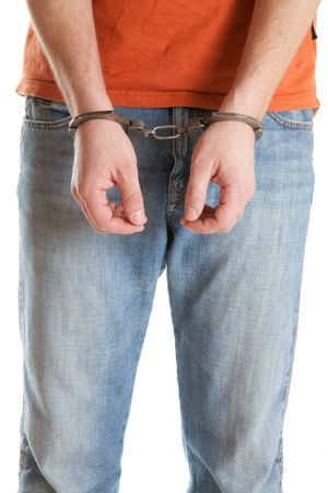 handcuffed man on white backgroundの写真素材