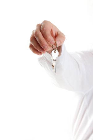 keys in hand on white backgroundの写真素材