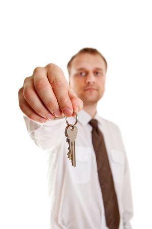 keys in hand on white backgroundの写真素材