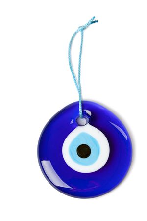 blue turkish eye on white backgroundの写真素材