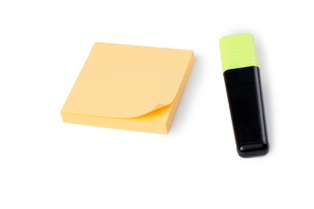 yellow note paper and pen on white backgroundの写真素材