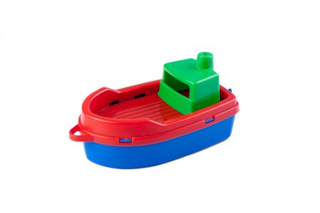 plastic toy boat on white backgroundの写真素材