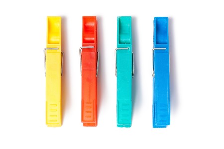 color clothes pins on white backgroundの写真素材