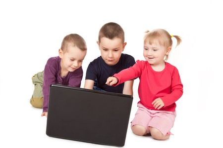 studio shot of childs whit laptopの写真素材