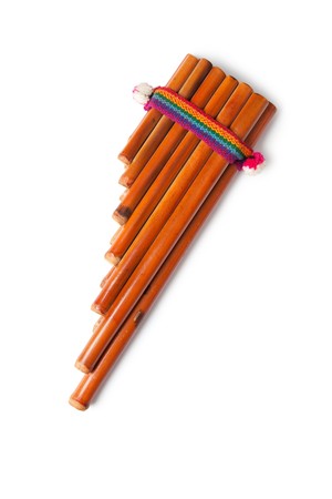 photo shot of pan flute on white background