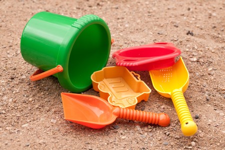 photo shot of beach toys on sendの写真素材