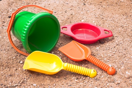 photo shot of beach toys on sendの写真素材