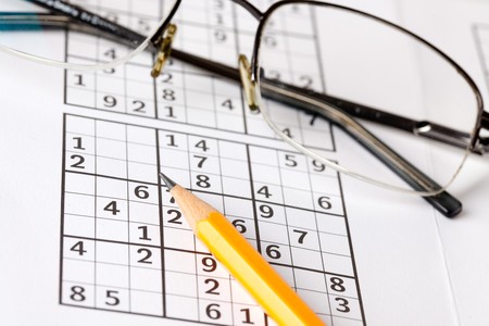 photo shot of sudoku game and pencilの写真素材