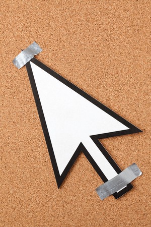 sticked mouse cursor on corkboardの写真素材