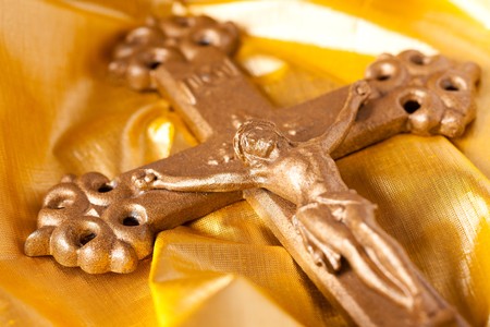 shot of cross on gold backgroundの写真素材