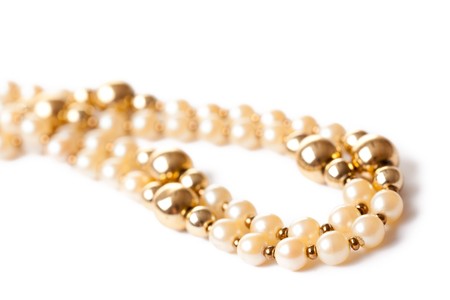pearl necklace on white backgroundの写真素材