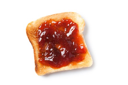 toast with jam on white background