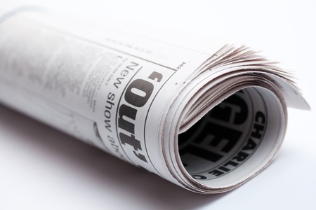 photo shot of roll of newspaperの写真素材