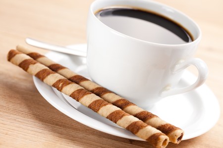 photo shot of coffee rolls and cupの写真素材