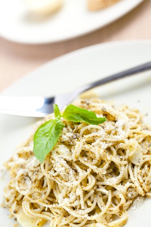 photo shot of spaghetti with basil pestoの写真素材