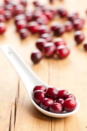 the fresh cranberries on kitchen tableの写真素材
