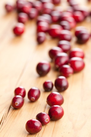 the fresh cranberries on kitchen tableの写真素材