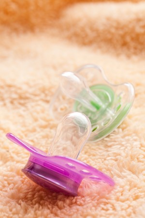 pacifier on soft background