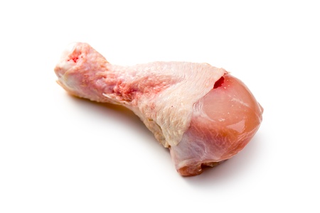 raw chicken legs on white backgroundの写真素材