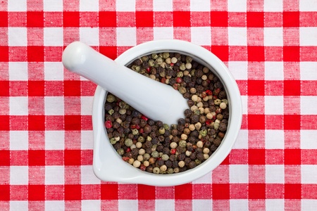 the pepper in ceramic mortarの写真素材