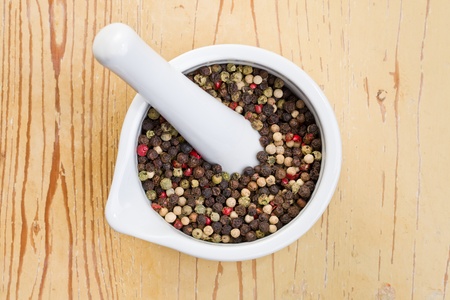 the pepper in ceramic mortarの写真素材