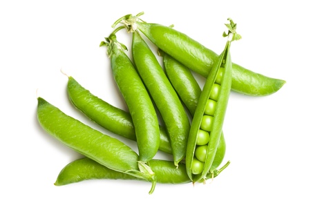fresh green peas on white backgroundの写真素材
