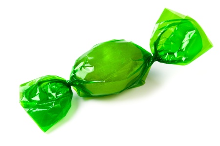 the green candy wrapped in foilの写真素材