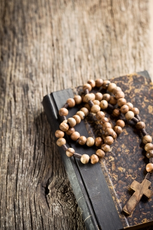 the holy bible and rosary beadsの写真素材