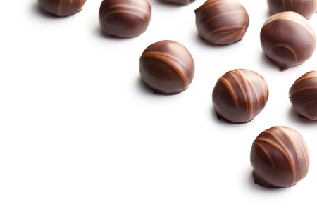 chocolate pralines on white backgroundの写真素材