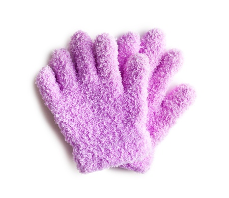 pink knitted gloves on white backgroundの写真素材