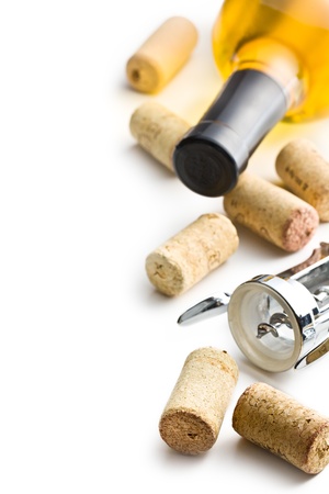 wine cork, corkscrew and bottle of white wine on white backgroundの写真素材