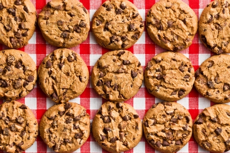 tha chocolate cookies on checkered tablecloth