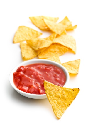 nachos and tomato dip on white backgroundの写真素材
