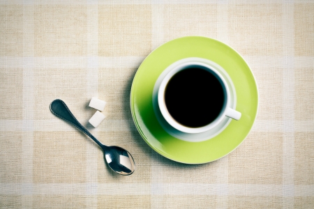 the black coffee in green cupの写真素材