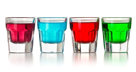 the various colorful liquors on white backgroundの写真素材