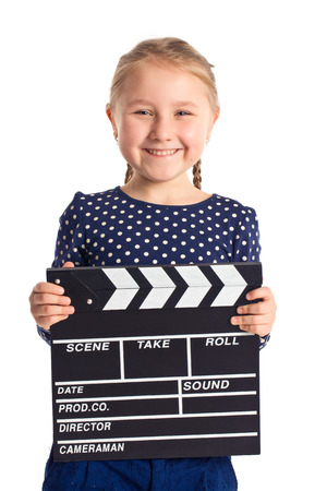 smiling girl with clapper board の写真素材