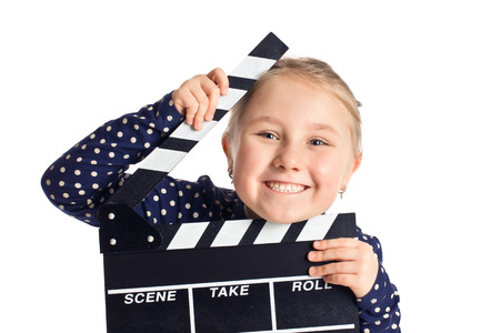 little girl with clapper board の写真素材
