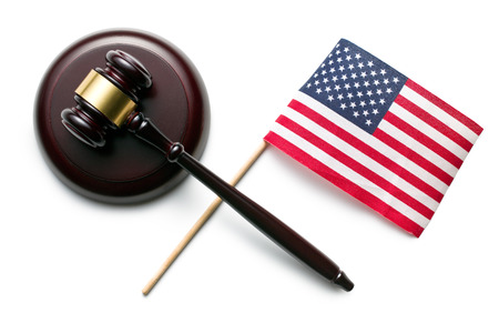 top view of judge gavel with american flag