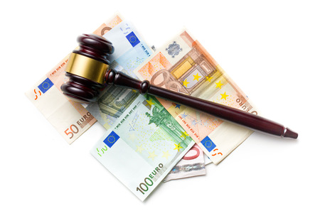 top view of judge gavel on euro bills on white backgroundの写真素材
