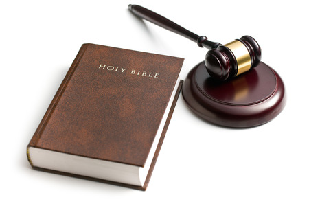 judge gavel with holy bible on white backgroundの写真素材