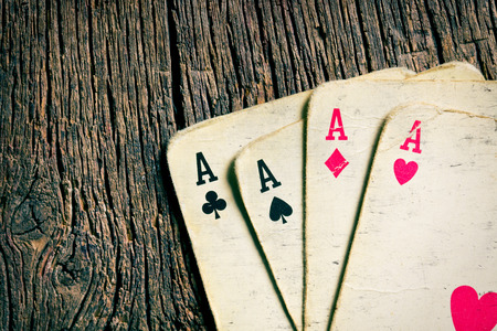 the old cards on wooden tableの写真素材