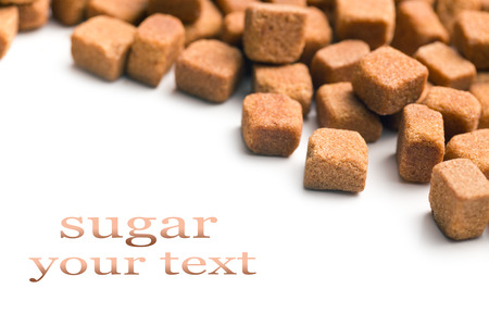 brown sugar cubes on white backgroundの写真素材