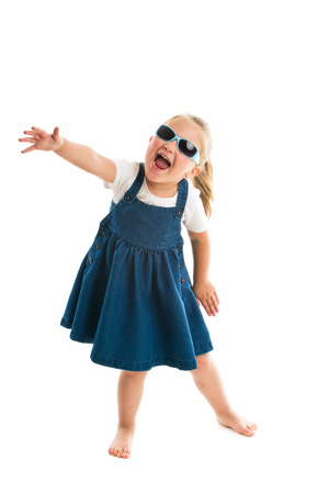 dancing little girl. studio shotの写真素材