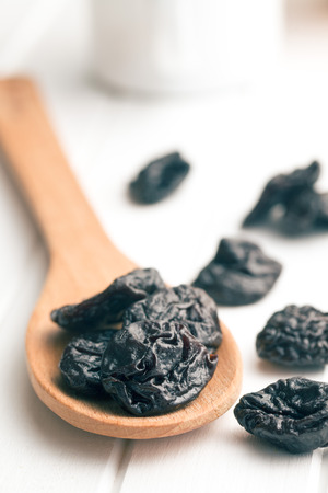 pitted prunes on white tableの写真素材