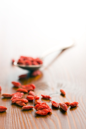dried goji berries on old tableの写真素材