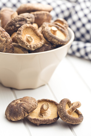the dried shiitake mushrooms on kitchen tableの写真素材