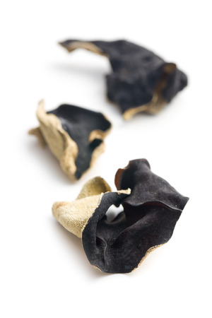 Dried chinese black fungus. Jelly ear on white background.の写真素材