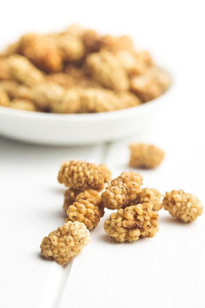 dried mulberry on white tableの写真素材