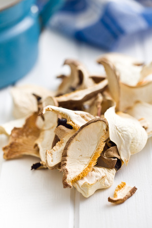 dried mushrooms on white tableの写真素材
