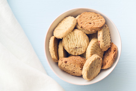 sweet cookies in ceramic bowlの写真素材
